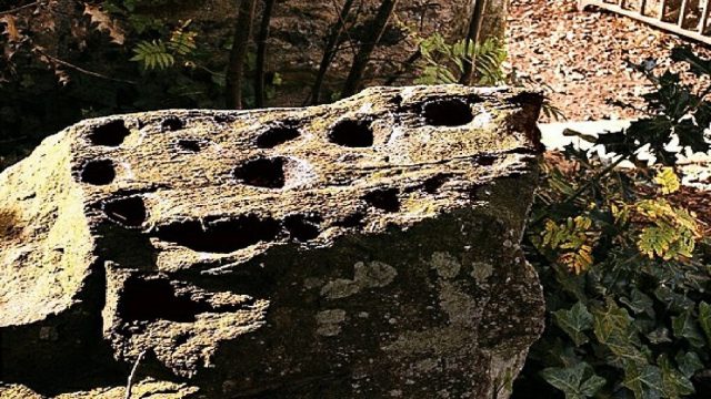 this cup marked stone sits in Fortingall church burial ground.